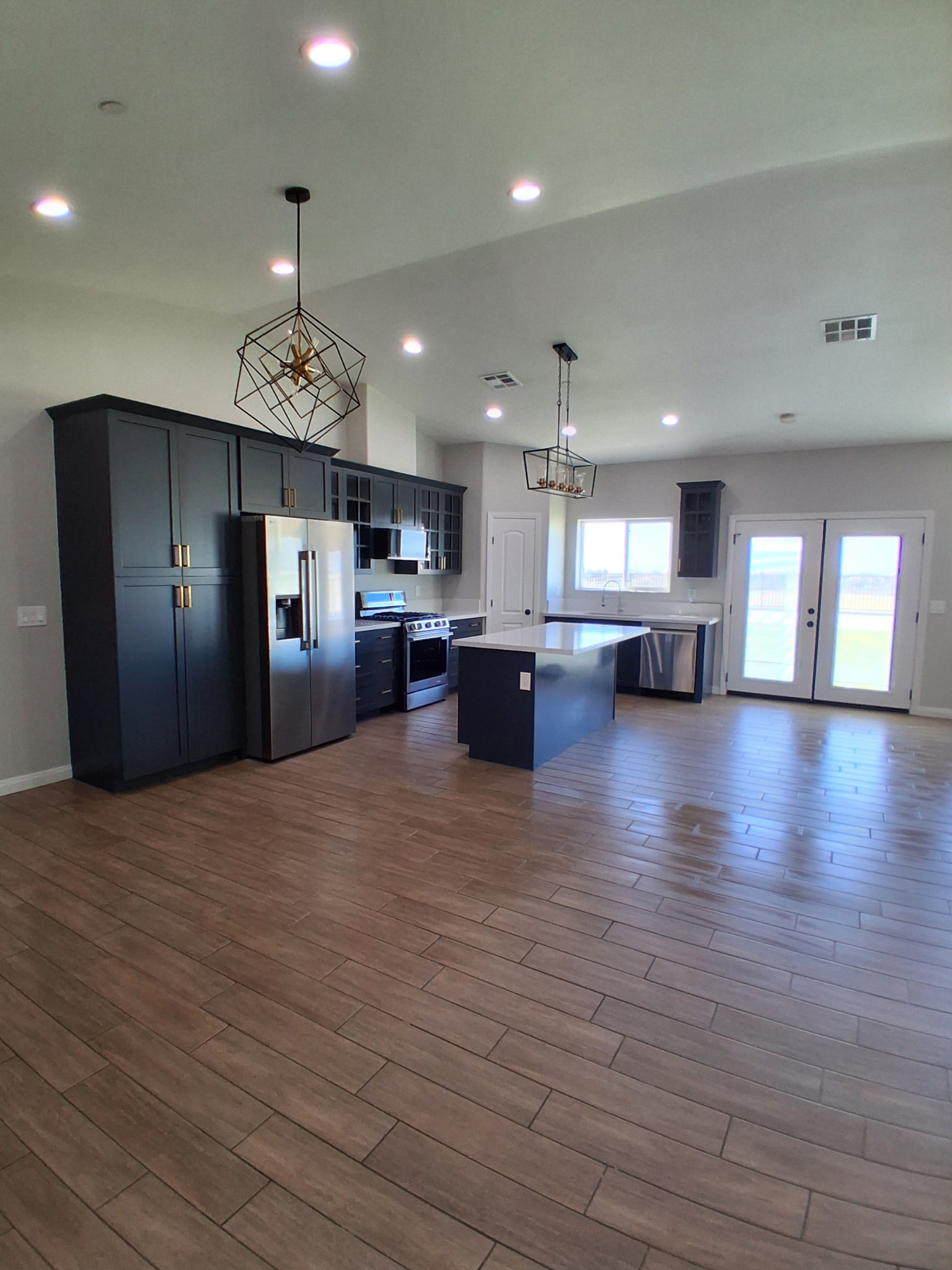 Spacious open-concept kitchen and great room cleaned by LPZ